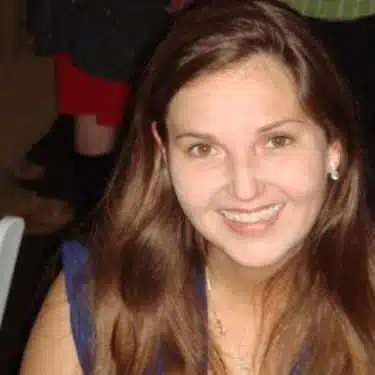 a person smiling for the camera