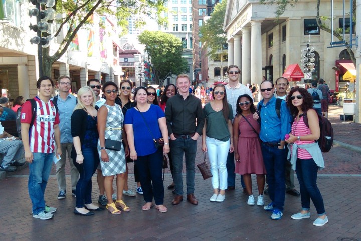 a group of people standing in front of a building